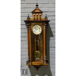 A late 19th century Vienna walnut and part ebonised regulator wall clock, weight driven movement,