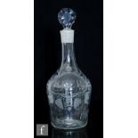 An 18th Century clear glass decanter circa 1770, of shoulder form, engraved with a simulated label