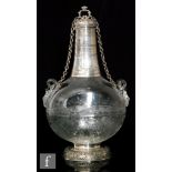 A late 19th Century Thomas Webb & Sons silver mounted rock crystal pilgrim flask, the compressed