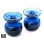 A pair of mid 20th Century deep blue glass candlesticks designed Erkki Vesanto for Iittala circa