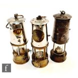 A Paterson miners lamp type B.7, another stamped IVF and numbered 37 and a protector lamp No 268. (