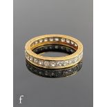 An 18ct diamond full eternity ring comprising twenty eight individually set stones, weight 2.8g,