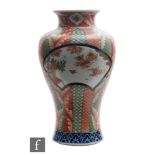 A Chinese Imari vase of meiping form rising from a splayed rim, decorated with fan shaped panels and
