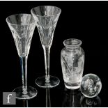 A pair of Waterford Crystal toasting flutes, part of the Millennium Collection titled 'Love', the