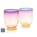 A pair of late 19th Century Thomas Webb & Sons Alexandrite tumblers of footed circular form with a