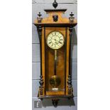 A late 19th century Vienna walnut and part ebonised regulator wall clock, single weight driven