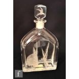 A clear crystal Orrefors decanter of shouldered form with collar neck and tablet form stopper,