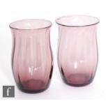 A pair of early 20th Century Whitefriars amethyst glass tumblers, circa 1935, each of swollen form