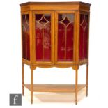 An Edwardian mahogany and satinwood cross-banded display cabinet of credence form, with a potboard