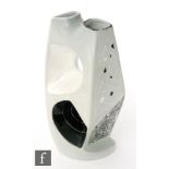 A post war Italian vase of abstract form with a twin neck and two irregular shaped apertures, the