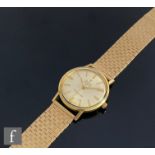 A gentleman's 18ct Zodiac automatic wrist watch, batons to a circular silvered dial, case diameter