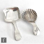 Two hallmarked silver caddy spoons one with shell bowl and plain handle, the other plain with square