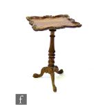 A 19th Century oak occasional flower or wine table in the manner of Gillows, the top of