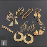 Ten pairs of assorted 9ct earrings to include hoop, stud and drop examples, total weight 30g. (10)