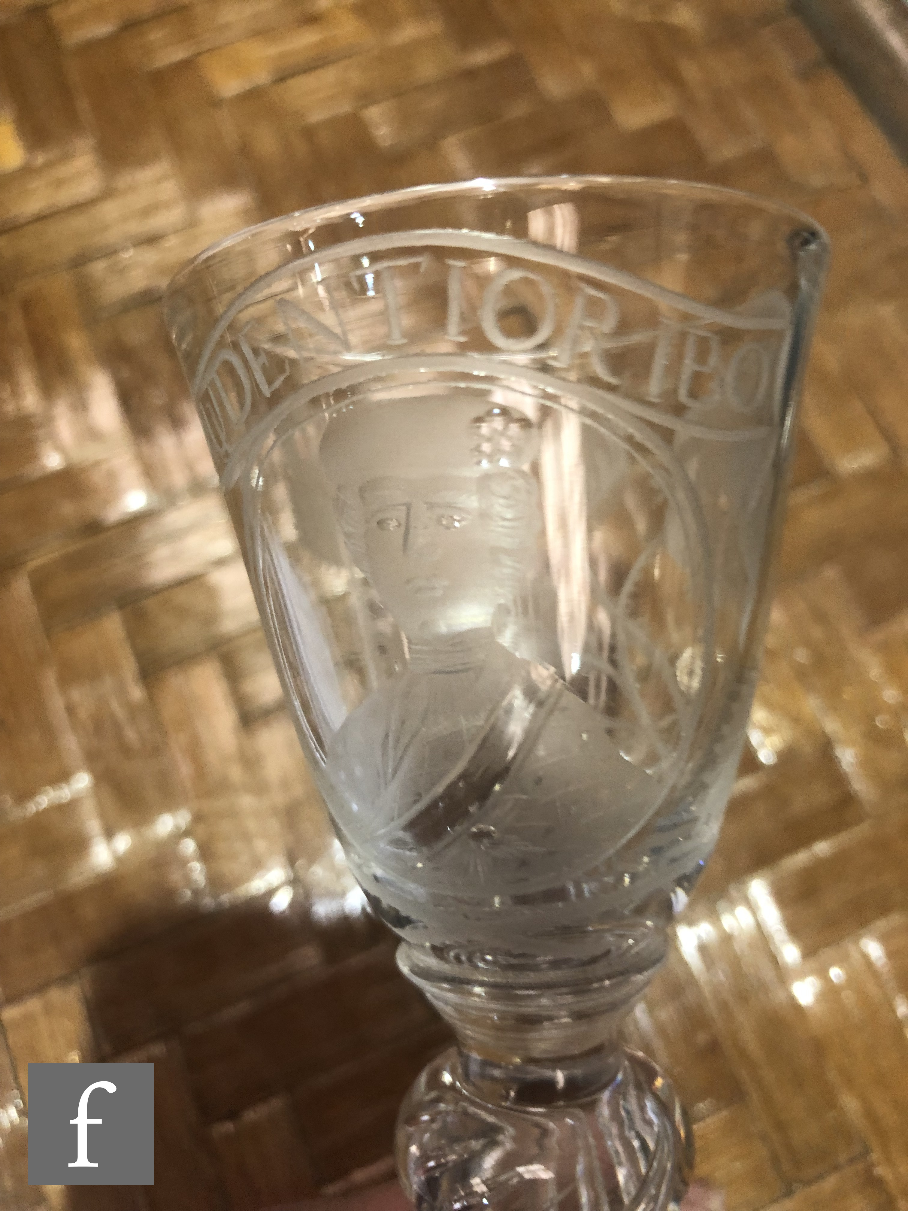 An 18th Century drinking glass circa 1750, the round funnel bowl engraved with a head and - Image 6 of 16