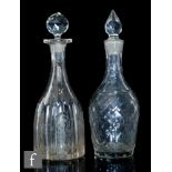 An 18th Century glass decanter circa 1750, of Indian club form, wheel cut and faceted in a diamond