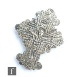 An 18th Century Armenian cross/crucifix, the white metal pendant with remnants of gilt, repousse