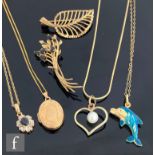 Six items of assorted 9ct modern jewellery to include two brooches and four pendants and chains to