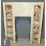 A late 19th Century cast iron fireplace in the Aesthetic taste, inset with a set of twelve 6in tiles