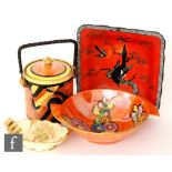 Four pieces of 1930s Art Deco Carlton Ware comprising a Jazz Stitch pattern biscuit barrel, a