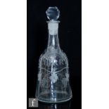 An 18th Century clear glass decanter circa 1770, of sugar loaf form, engraved with a cartouche