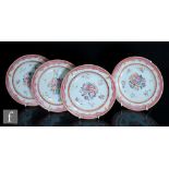 A collection of four Chinese famille rose Qianlong period (1711-1799) dishes, each with central