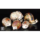 Five boxed Royal Crown Derby paperweights comprising Russian Bear, Garden Snail, Bramble Hedgehog,