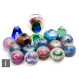 A collection of assorted paperweights to include Caithness, Okra and Glassform examples. (13)