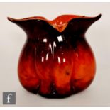 A later 20th Century Czechoslovakian studio glass vase of compressed ovoid form with dimple