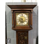 A late 18th Century oak longcase clock with an associated 30-hour movement striking on a bell, the