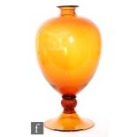 A 1930s Veronese vase designed by Vittorio Zecchin for Venini, the ovoid amber glass vase on