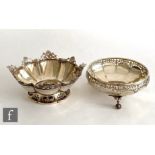 A hallmarked silver cushioned octagonal bowl with pierced border, diameter 15cm, with a similar