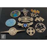 Ten assorted silver brooches to include an oval Ruskin and a butterfly wing example, various