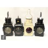 Two BR black painted guards hand lamps, a white painted BR(M) hand lamp and a Sandstar guards