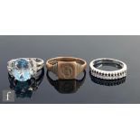 Two 9ct white gold stone set rings to include a blue topaz example, with a 9ct signet ring, total