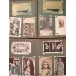 Two early 20th Century postcard albums containing approximately three hundred cards, including