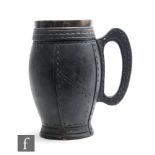 A late 19th Century Doulton Silicon Ware leather ware beer mug, the whole imitating black leather