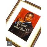 A side portrait study of Frank Bruno, signed 'best wishes', 40cm x 32cm, framed.