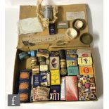 A collection of early 20th Century packaging, mostly miniature sample tins and similar, collated