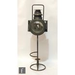 An Osmeka railway permanent way lamp, on stand, to take a gas canister.