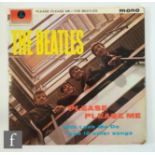 A Beatles LP, Please, Please Me, PMC 1202, first pressing, black and gold Parlophone label, with