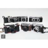 A collection of vintage 1950s/60s cameras to include an Edixa stereo 35mm viewfinder stereo