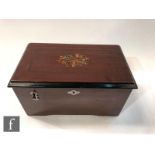 A Britannia disc musical box playing 5 inch discs, lever operation, transfer detail to lid and