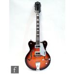 A Gretsch Sunburst 12-string semi-acoustic guitar, serial number KS15023750 made in Korea, model