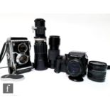 A Mamiya C3 TLR camera, a Mamiya 645 with four interchangeable lenses including a Solligor telephoto