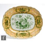 A 19th Century meat plate decorated in green and yellow, the rounded central well with a green