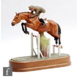 A boxed limited edition Royal Worcester Equestrian Statuette of Merano and Cap. Raimondo d'Inzeo,