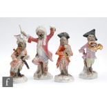 Four 19th Century continental Monkey Band orchestra musicians, after the Meissen original,