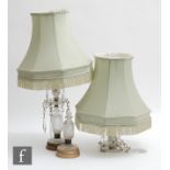 A pair of 20th Century cut glass drop lustre table lamps and shades, height 30cm, one A/F. (2)