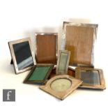 Seven early 20th Century hallmarked silver easel photograph frames to include rectangular and square
